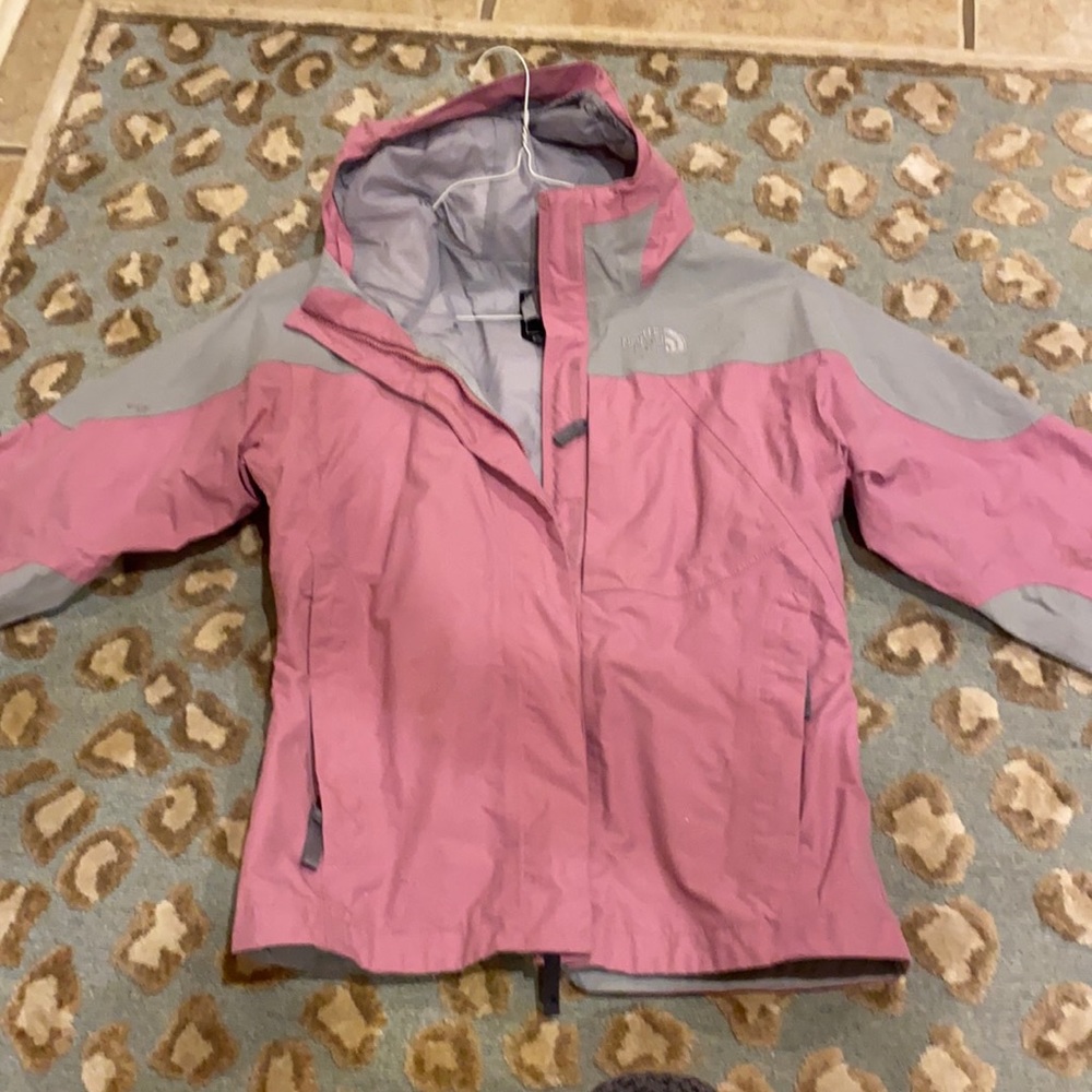 pink and grey northface rain jacket